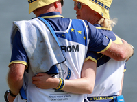 GAINESVILLE, VIRGINIA - SEPTEMBER 15: Madelene Sagstrom of Team Europe walks with her caddie on the 18th green at the conclusion of the Solh...