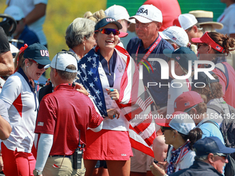 GAINESVILLE, VIRGINIA - SEPTEMBER 15: Lexi Thompson of the United States celebrates a Team USA lead on the 18th green at the conclusion of t...