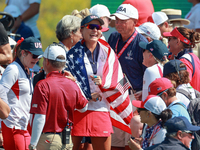 GAINESVILLE, VIRGINIA - SEPTEMBER 15: Lexi Thompson of the United States celebrates a Team USA lead on the 18th green at the conclusion of t...