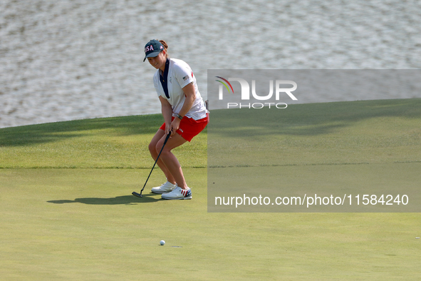 GAINESVILLE, VIRGINIA - SEPTEMBER 15: Ally Ewing of the United States reacts to her putt on hole 11 during the final round of the Solheim Cu...