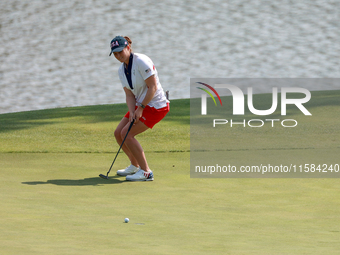 GAINESVILLE, VIRGINIA - SEPTEMBER 15: Ally Ewing of the United States reacts to her putt on hole 11 during the final round of the Solheim Cu...