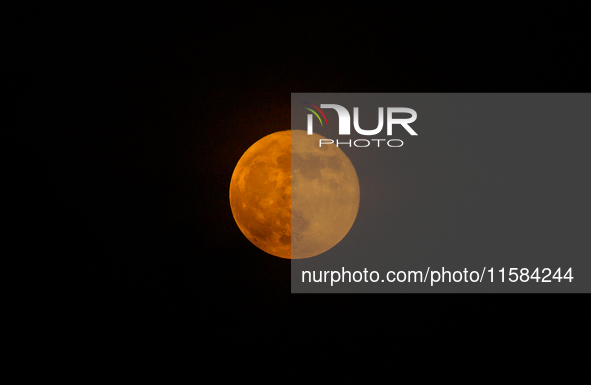 A view of the harvest moon in Tehatta, India, on September 18, 2024 