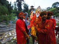 Nepali Hindu devotees carry an eco-friendly idol of Lord Bishwokarma to immerse it in the Bagmati River in Kathmandu, Nepal, on September 18...