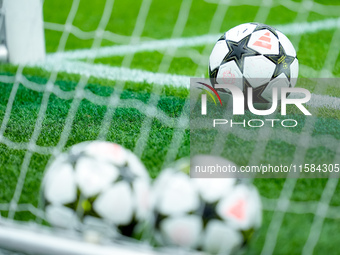 Official UEFA Champions League match balls during the UEFA Champions League 2024/25 League Phase MD1 match between AC Milan and Liverpool FC...