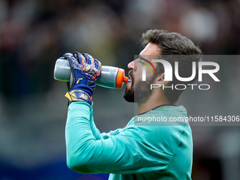 Alisson Becker of Liverpool FC during the UEFA Champions League 2024/25 League Phase MD1 match between AC Milan and Liverpool FC at Stadio S...