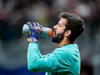 Alisson Becker of Liverpool FC during the UEFA Champions League 2024/25 League Phase MD1 match between AC Milan and Liverpool FC at Stadio S...