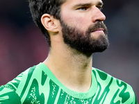 Alisson Becker of Liverpool FC looks on during the UEFA Champions League 2024/25 League Phase MD1 match between AC Milan and Liverpool FC at...