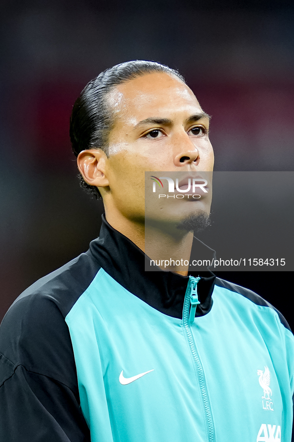 Virgil van Dijk of Liverpool FC looks on during the UEFA Champions League 2024/25 League Phase MD1 match between AC Milan and Liverpool FC a...