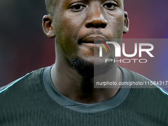 Ibrahima Konate' of Liverpool FC looks on during the UEFA Champions League 2024/25 League Phase MD1 match between AC Milan and Liverpool FC...