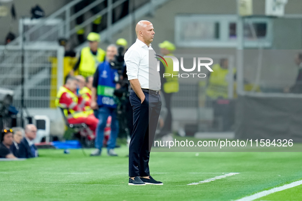 Arne Slot head coach of Liverpool FC looks on during the UEFA Champions League 2024/25 League Phase MD1 match between AC Milan and Liverpool...