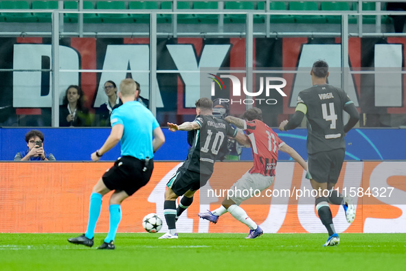 Christian Pulisic of AC Milan scores first goal during the UEFA Champions League 2024/25 League Phase MD1 match between AC Milan and Liverpo...