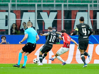 Christian Pulisic of AC Milan scores first goal during the UEFA Champions League 2024/25 League Phase MD1 match between AC Milan and Liverpo...