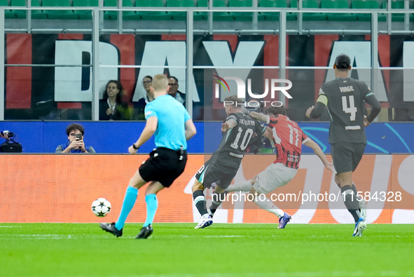 Christian Pulisic of AC Milan scores first goal during the UEFA Champions League 2024/25 League Phase MD1 match between AC Milan and Liverpo...