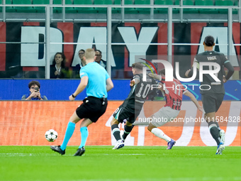 Christian Pulisic of AC Milan scores first goal during the UEFA Champions League 2024/25 League Phase MD1 match between AC Milan and Liverpo...