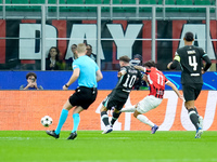 Christian Pulisic of AC Milan scores first goal during the UEFA Champions League 2024/25 League Phase MD1 match between AC Milan and Liverpo...