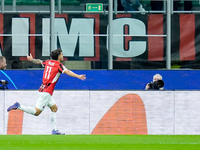 Christian Pulisic of AC Milan celebrates after scoring first goal during the UEFA Champions League 2024/25 League Phase MD1 match between AC...