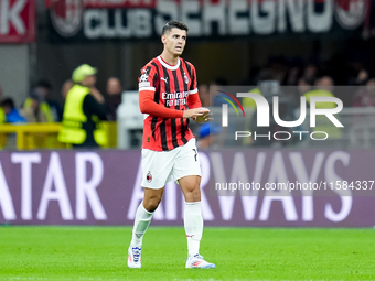 Alvaro Morata of AC Milan gestures during the UEFA Champions League 2024/25 League Phase MD1 match between AC Milan and Liverpool FC at Stad...