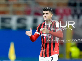 Alvaro Morata of AC Milan gestures during the UEFA Champions League 2024/25 League Phase MD1 match between AC Milan and Liverpool FC at Stad...