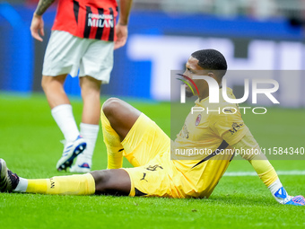 Mike Maignan of AC Milan lies down injured during the UEFA Champions League 2024/25 League Phase MD1 match between AC Milan and Liverpool FC...