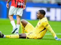 Mike Maignan of AC Milan lies down injured during the UEFA Champions League 2024/25 League Phase MD1 match between AC Milan and Liverpool FC...