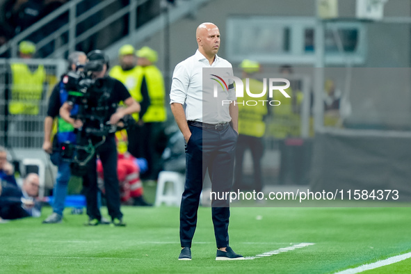 Arne Slot head coach of Liverpool FC looks on during the UEFA Champions League 2024/25 League Phase MD1 match between AC Milan and Liverpool...