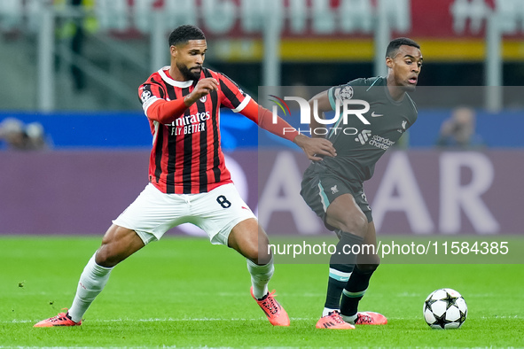 Ruben Loftus-Cheek of AC Milan and Ryan Gravenberch of Liverpool FC compete for the ball during the UEFA Champions League 2024/25 League Pha...