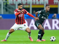 Ruben Loftus-Cheek of AC Milan and Ryan Gravenberch of Liverpool FC compete for the ball during the UEFA Champions League 2024/25 League Pha...