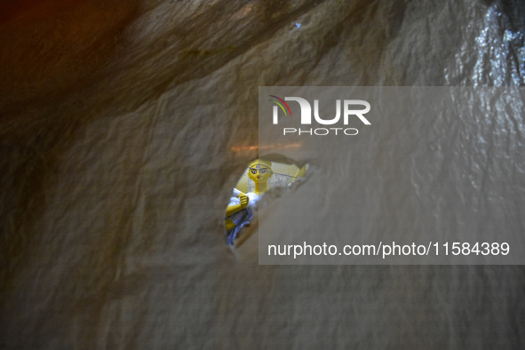 An unfinished idol of the goddess Durga is seen at a potter's hub in Kolkata, India, on September 18, 2024. 