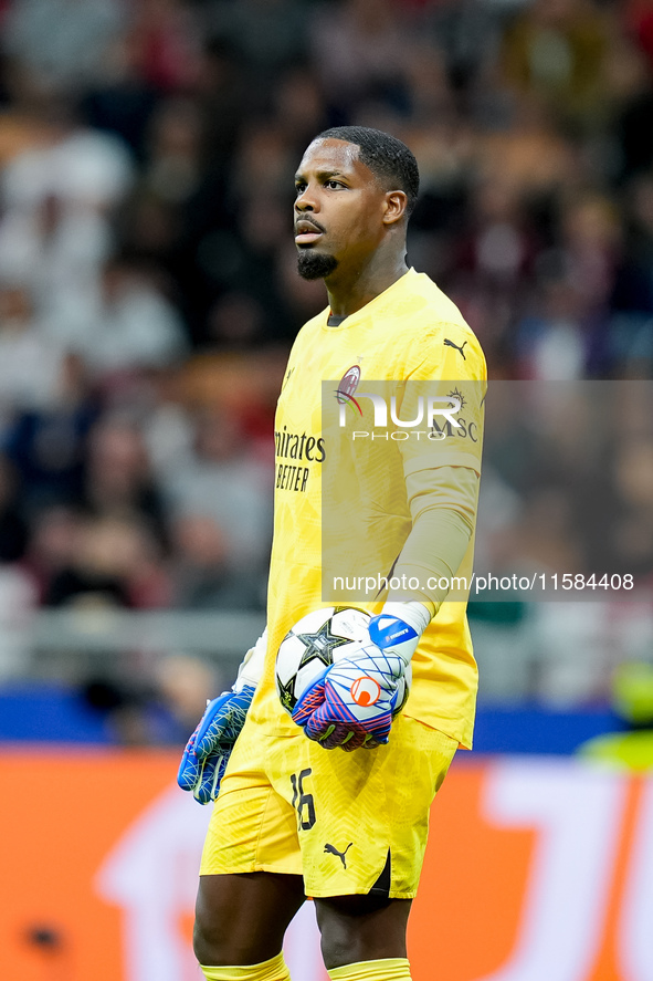 Mike Maignan of AC Milan looks on during the UEFA Champions League 2024/25 League Phase MD1 match between AC Milan and Liverpool FC at Stadi...