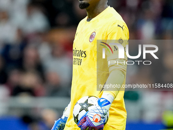 Mike Maignan of AC Milan looks on during the UEFA Champions League 2024/25 League Phase MD1 match between AC Milan and Liverpool FC at Stadi...