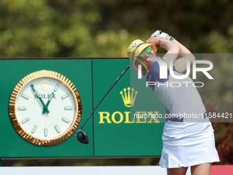 GAINESVILLE, VIRGINIA - SEPTEMBER 15: Madelene Sagstrom of Team Europe hits from the 12th tee during the final round of the Solheim Cup at R...