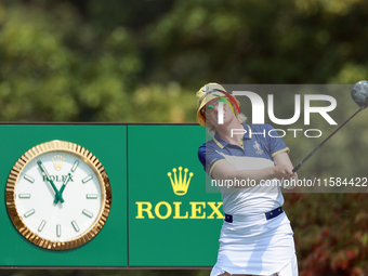 GAINESVILLE, VIRGINIA - SEPTEMBER 15: Madelene Sagstrom of Team Europe hits from the 12th tee during the final round of the Solheim Cup at R...