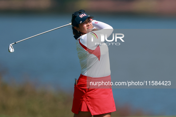 GAINESVILLE, VIRGINIA - SEPTEMBER 15: Lilia Vu of of Team USA hits from the 12th fairway during the final round of the Solheim Cup at Robert...