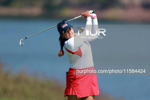 GAINESVILLE, VIRGINIA - SEPTEMBER 15: Lilia Vu of Team USA hits from the 12th fairway during the final round of the Solheim Cup at Robert Tr...