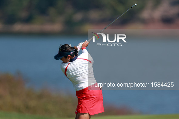 GAINESVILLE, VIRGINIA - SEPTEMBER 15: Lilia Vu of Team USA hits from the 12th fairway during the final round of the Solheim Cup at Robert Tr...