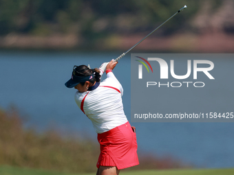 GAINESVILLE, VIRGINIA - SEPTEMBER 15: Lilia Vu of Team USA hits from the 12th fairway during the final round of the Solheim Cup at Robert Tr...