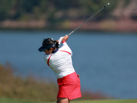 GAINESVILLE, VIRGINIA - SEPTEMBER 15: Lilia Vu of Team USA hits from the 12th fairway during the final round of the Solheim Cup at Robert Tr...