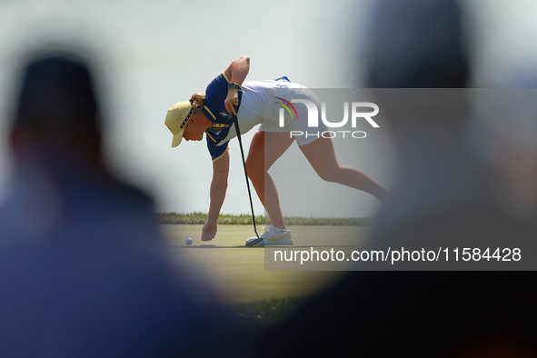 GAINESVILLE, VIRGINIA - SEPTEMBER 15: Maja Stark of Team Europe* marks her ball on the 12th green  during the final round of the Solheim Cup...