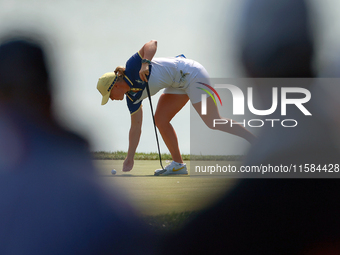 GAINESVILLE, VIRGINIA - SEPTEMBER 15: Maja Stark of Team Europe* marks her ball on the 12th green  during the final round of the Solheim Cup...