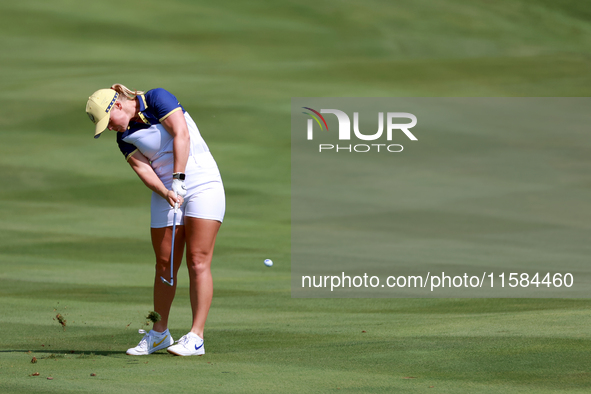 GAINESVILLE, VIRGINIA - SEPTEMBER 15: Maja Stark of Team Europe hits from the 12th fairway during the final round of the Solheim Cup at Robe...