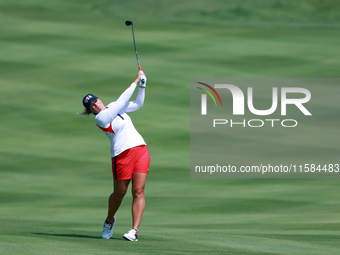 GAINESVILLE, VIRGINIA - SEPTEMBER 15: Lauren Coughlin of the United States hits from the 12th fairway during the final round of the Solheim...