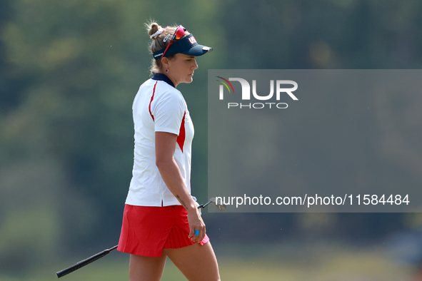 GAINESVILLE, VIRGINIA - SEPTEMBER 15: Lexi Thompson of the United States walks on the 12th green during the final round of the Solheim Cup a...