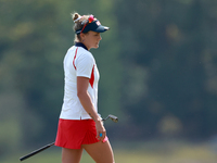 GAINESVILLE, VIRGINIA - SEPTEMBER 15: Lexi Thompson of the United States walks on the 12th green during the final round of the Solheim Cup a...