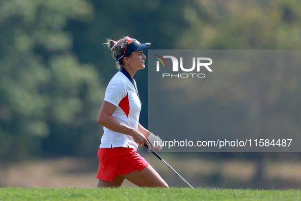 GAINESVILLE, VIRGINIA - SEPTEMBER 15: Lexi Thompson of the United States walks to the 12th green after hitting from the bunker during the fi...