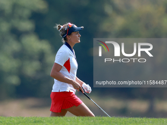 GAINESVILLE, VIRGINIA - SEPTEMBER 15: Lexi Thompson of the United States walks to the 12th green after hitting from the bunker during the fi...