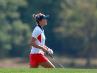 GAINESVILLE, VIRGINIA - SEPTEMBER 15: Lexi Thompson of the United States walks to the 12th green after hitting from the bunker during the fi...