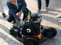 The Butty robot from the Danish robotics company demonstrates cleaning cigarette butts on the opening day of Deutsche Telekom's Digital X ev...