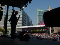 Timotheus Hoettges, CEO of Deutsche Telekom, speaks on the stage at Media Park on the opening day of Deutsche Telekom's Digital X event in C...