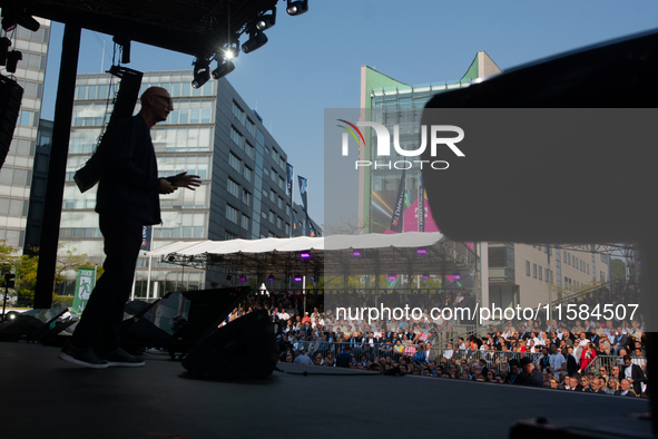 Timotheus Hoettges, CEO of Deutsche Telekom, speaks on the stage at Media Park on the opening day of Deutsche Telekom's Digital X event in C...