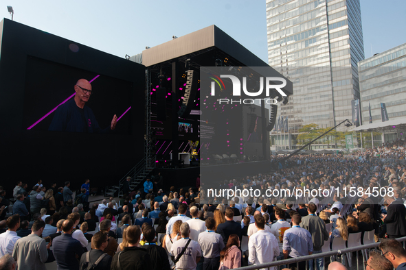 Timotheus Hoettges, CEO of Deutsche Telekom, speaks on the stage at Media Park on the opening day of Deutsche Telekom's Digital X event in C...